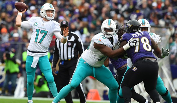 Dec 4, 2016; Baltimore, MD, USA;  Miami Dolphins quarterback Ryan Tannehill (17) passes as  tackle Ja'Wuan James (70) blocks Baltimore Ravens defensive tackle Michael Pierce (78) during the second quarter at M&T Bank Stadium. Photo Credit: Tommy Gilligan-USA TODAY Sports