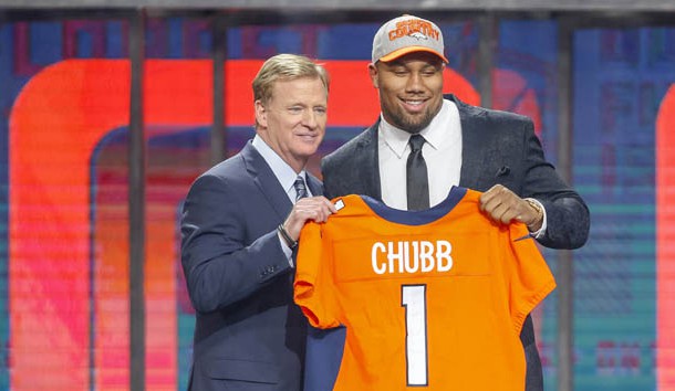 Apr 26, 2018; Arlington, TX, USA; Bradley Chubb (North Carolina State) poses with NFL commissioner Roger Goodell after being selected as the number five overall pick to the Denver Broncos in the first round of the 2018 NFL Draft at AT&T Stadium.  Photo Credit: Tim Heitman-USA TODAY Sports