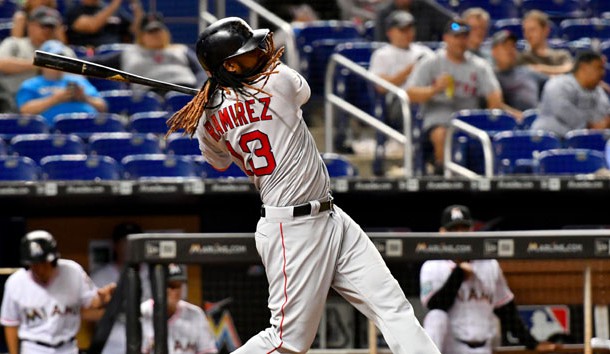 Apr 2, 2018; Miami, FL, USA; Boston Red Sox first baseman Hanley Ramirez (13) connects for a base hit during the ninth inning against the Miami Marlins at Marlins Park. Photo Credit: Steve Mitchell-USA TODAY Sports