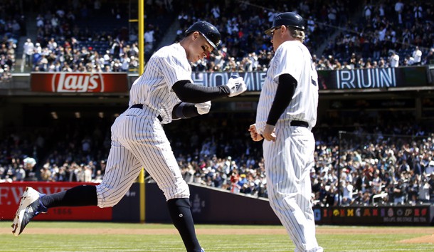 Apr 21, 2018; Bronx, NY, USA; New York Yankees right fielder Aaron Judge (99) celebrates a two-run home run with Yankees third base coach Phil Nevin (53) against the Toronto Blue Jays during the third inning at Yankee Stadium. Photo Credit: Adam Hunger-USA TODAY Sports