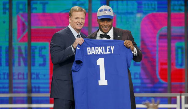 Apr 26, 2018; Arlington, TX, USA; Saquon Barkley (Penn State) poses with NFL commissioner Roger Goodell after being selected as the number two overall pick to the New York Giants in the first round of the 2018 NFL Draft at AT&T Stadium.  Photo Credit: Tim Heitman-USA TODAY Sports