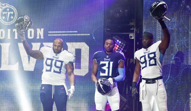 Apr 3, 2018; Nashville, TN, USA; Tennessee Titans defensive tackle Jurrell Casey (99), safety Kevin Byard (31), linebacker Brian Orakpo (98), show off their new uniforms during the Titans uniform reveal event held at Broadway and 1st Avenue. Photo Credit: Andrew Nelles / The Tennessean Appeal via USA TODAY NETWORK
