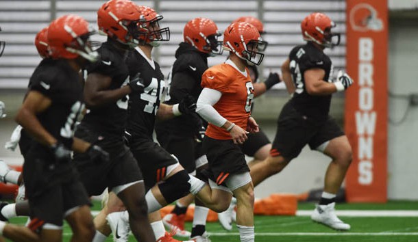 May 4, 2018; Berea, OH, USA; Cleveland Browns rookies run through warm ups, including quarterback Baker Mayfield (orange jersey) during rookie minicamp at the Cleveland Browns training facility. Photo Credit: Ken Blaze-USA TODAY Sports