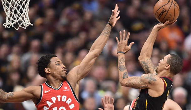 May 5, 2018; Cleveland, OH, USA; Cleveland Cavaliers guard George Hill (3) shoots over the defense of Toronto Raptors guard DeMar DeRozan (10) during the first half in game three of the second round of the 2018 NBA Playoffs at Quicken Loans Arena. Photo Credit: Ken Blaze-USA TODAY Sports `