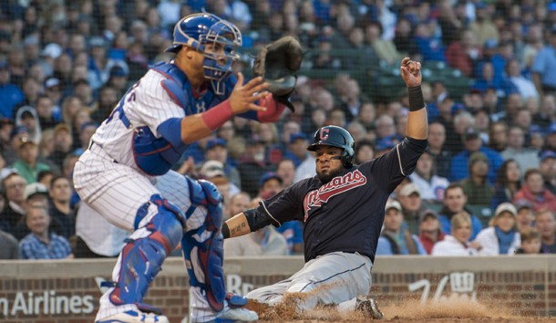 May 22, 2018; Chicago, IL, USA; Cleveland Indians right fielder Melky Cabrera (53) slides safely into home plate against Chicago Cubs catcher Willson Contreras (40) during the fourth inning at Wrigley Field. Photo Credit: Patrick Gorski-USA TODAY Sports