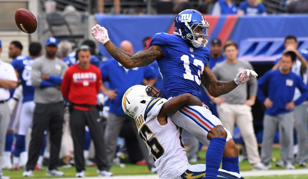 Oct 8, 2017; East Rutherford, NJ, USA;  New York Giants wide receiver Odell Beckham Jr. (13) can't hang onto a 4th quarter pass and injured himself on the play. He left the game on a cart at MetLife Stadium. Photo Credit: Robert Deutsch-USA TODAY Sports