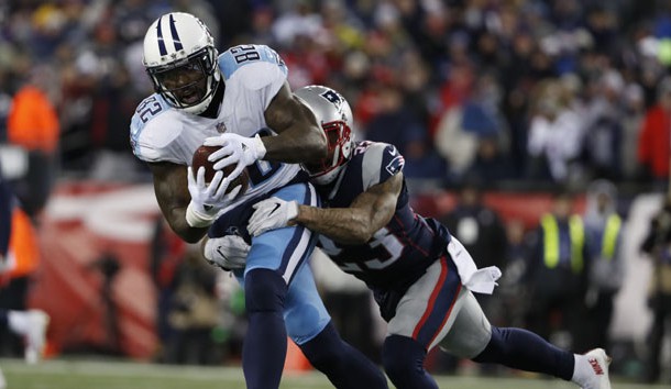 Jan 13, 2018; Foxborough, MA, USA; Tennessee Titans tight end Delanie Walker (82) runs the ball against New England Patriots strong safety Patrick Chung (23) during the second quarter in the AFC Divisional playoff game at Gillette Stadium. Photo Credit: Winslow Townson-USA TODAY Sports