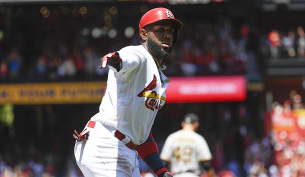 Jun 3, 2018; St. Louis, MO, USA; St. Louis Cardinals left fielder Marcell Ozuna (23) hits a grand slam against the Pittsburgh Pirates during the first inning at Busch Stadium. Photo Credit: Scott Rovak-USA TODAY Sports