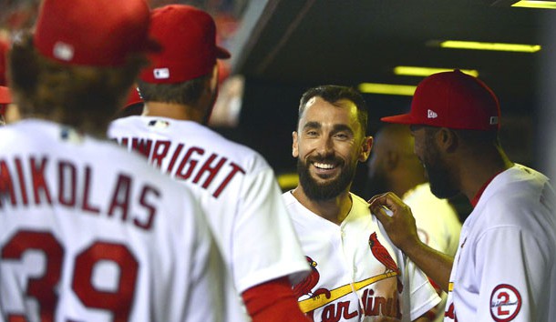 Jun 26, 2018; St. Louis, MO, USA; St. Louis Cardinals third baseman Matt Carpenter (13) is congratulated by teammates after hitting his second solo home run of the game in the eighth inning at Busch Stadium. Carpenter went five for five in the game. Photo Credit: Jeff Curry-USA TODAY Sports