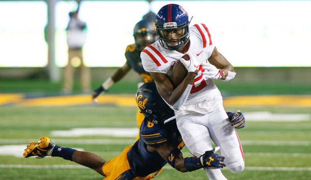 Sep 16, 2017; Berkeley, CA, USA; California Golden Bears safety Jaylinn Hawkins (6) attempts to tackle Mississippi Rebels wide receiver Van Jefferson (12) during the third quarter at Memorial Stadium. Photo Credit: Stan Szeto-USA TODAY Sports