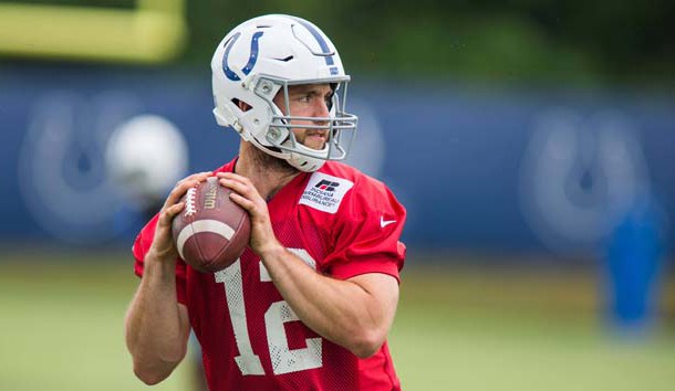 Jun 12, 2018; Indianapolis, IN, USA; Indianapolis Colts quarterback Andrew Luck (12) drops back to pass the ball during mini camp at Indiana Farm Bureau Football Center. Photo Credit: Trevor Ruszkowski-USA TODAY Sports