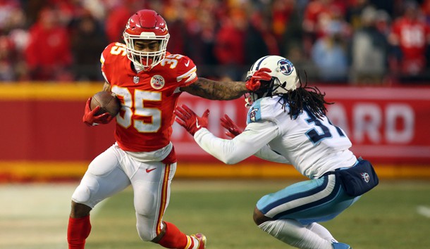 Jan 6, 2018; Kansas City, MO, USA; Kansas City Chiefs running back Charcandrick West (35) runs against Tennessee Titans safety Johnathan Cyprien (37) in the first half in the AFC Wild Card playoff football game at Arrowhead Stadium. Photo Credit: Jay Biggerstaff-USA TODAY Sports