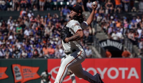 Jul 11, 2018; San Francisco, CA, USA; San Francisco Giants starting pitcher Dereck Rodriguez (57) pitches against the Chicago Cubs during the eleventh inning at AT&T Park. Photo Credit: Stan Szeto-USA TODAY Sports