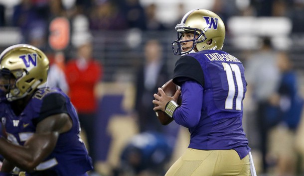 Sep 16, 2017; Seattle, WA, USA; Washington Huskies quarterback K.J. Carta-Samuels (11) looks to pass against the Fresno State Bulldogs during the third quarter at Husky Stadium. Photo Credit: Joe Nicholson-USA TODAY Sports