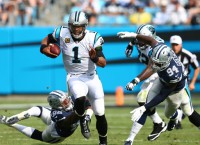 Panthers hold off Cowboys in season opener
