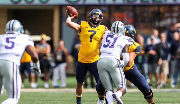 Sep 22, 2018; Morgantown, WV, USA; West Virginia Mountaineers quarterback Will Grier (7) throws a pass during the first quarter against the Kansas State Wildcats at Mountaineer Field at Milan Puskar Stadium. Photo Credit: Ben Queen-USA TODAY Sports