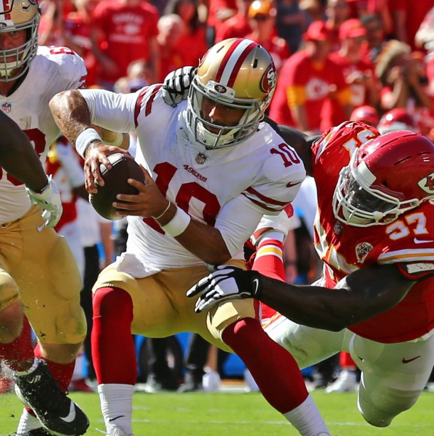 Sep 23, 2018; Kansas City, MO, USA; San Francisco 49ers quarterback Jimmy Garoppolo (10) is tackled by Kansas City Chiefs defensive end Allen Bailey (97) in the second half at Arrowhead Stadium. Photo Credit: Jay Biggerstaff-USA TODAY Sports