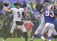 Flacco hits on all cylinders, Ravens crush Bills