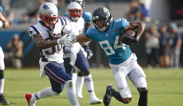 Sep 16, 2018; Jacksonville, FL, USA; Jacksonville Jaguars wide receiver Keelan Cole (84) runs out of bounds defended by New England Patriots cornerback Jason McCourty (30) during the second quarter at TIAA Bank Field. Photo Credit: Reinhold Matay-USA TODAY Sports