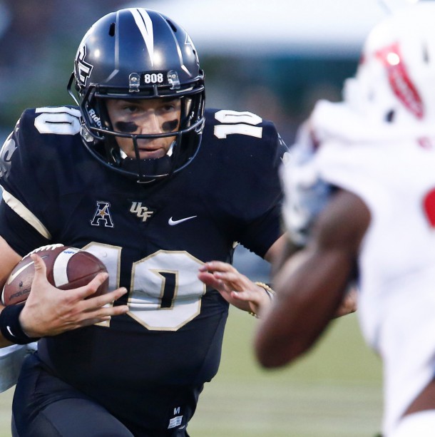 Sep 21, 2018; Orlando, FL, USA; UCF Knights quarterback McKenzie Milton (10) runs the ball as wide receiver Dredrick Snelson (5) blocks Florida Atlantic Owls safety Zyon Gilbert (24) during the first quarter at Spectrum Stadium. Photo Credit: Reinhold Matay-USA TODAY Sports