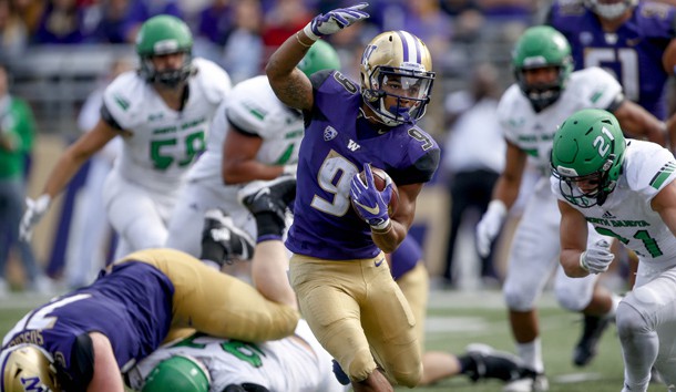 Sep 8, 2018; Seattle, WA, USA; Washington Huskies running back Myles Gaskin (9) dances around North Dakota Fighting Hawks defenders during the third quarter at Husky Stadium. Photo Credit: Jennifer Buchanan-USA TODAY Sports