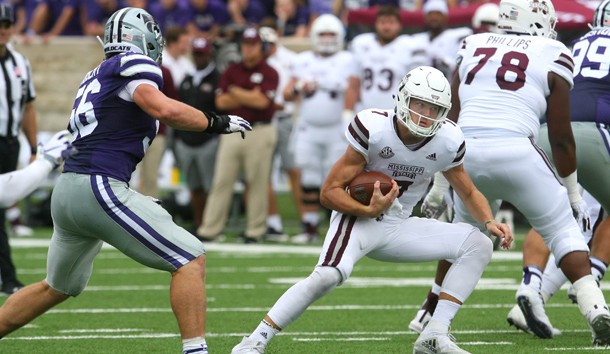 Sep 8, 2018; Manhattan, KS, USA; Mississippi State Bulldogs quarterback Nick Fitzgerald (7) carries the ball against Kansas State Wildcats defensive end Wyatt Hubert (56) during the fourth quarter at Bill Snyder Family Stadium. The Bulldogs won 31-10. Photo Credit: Scott Sewell-USA TODAY Sports