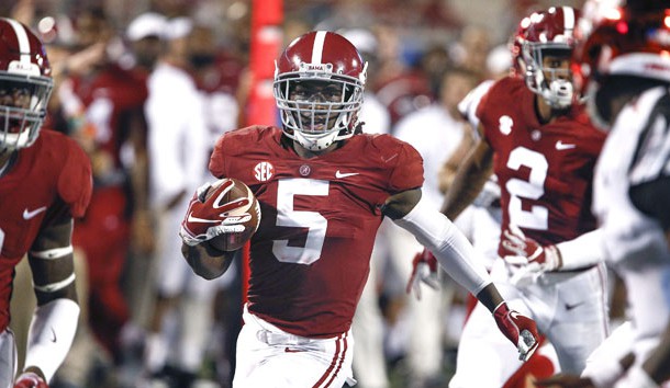 Sep 1, 2018; Orlando, FL, USA; Alabama Alabama Crimson Tide defensive back Shyheim Carter (5) returns an interception for the score against the Louisville Cardinals during the second half at Camping World Stadium. Photo Credit: Reinhold Matay-USA TODAY Sports