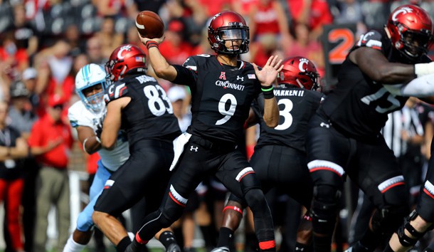 Oct 6, 2018; Cincinnati, OH, USA; Cincinnati Bearcats quarterback Desmond Ridder (9) throws a pass against the Tulane Green Wave in the first half at Nippert Stadium. Photo Credit: Aaron Doster-USA TODAY Sports