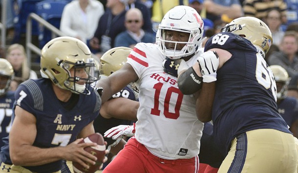 Oct 20, 2018; Annapolis, MD, USA; Houston Cougars defensive tackle Ed Oliver (10) applies pressure on Navy Midshipmen quarterback Garret Lewis (7)  as guard David Forney (68) blocks during the second quarter at Navy-Marine Corps Memorial Stadium. Photo Credit: Tommy Gilligan-USA TODAY Sports