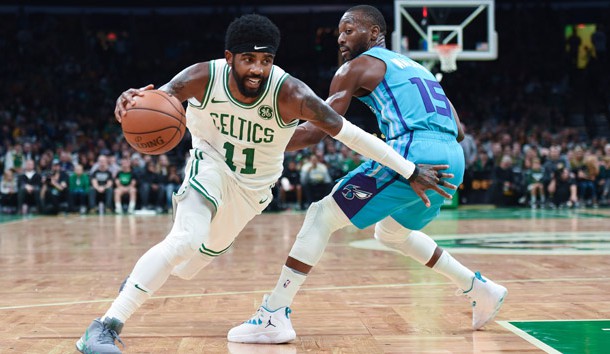 Sep 30, 2018; Boston, MA, USA; Boston Celtics guard Kyrie Irving (11) drives to the basket past Charlotte Hornets guard Kemba Walker (15) during the first half at TD Garden. Photo Credit: Bob DeChiara-USA TODAY Sports