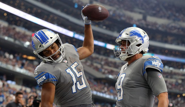 Sep 30, 2018; Arlington, TX, USA; Detroit Lions receiver  Golden Tate (15) spikes the ball while celebrating a fourth quarter touchdown with quarterback Matthew Stafford (9) against the Dallas Cowboys at AT&T Stadium. Photo Credit: Matthew Emmons-USA TODAY Sports