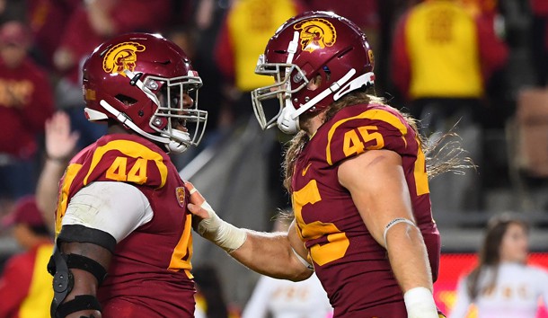 Oct 13, 2018; Los Angeles, CA, USA; USC Trojans defensive lineman Malik Dorton (44) and linebacker Porter Gustin (45) celebrate after sacking Colorado Buffaloes quarterback Steven Montez (not pictured) in the third quarter at the Los Angeles Memorial Coliseum. Photo Credit: Jayne Kamin-Oncea-USA TODAY Sports