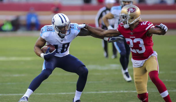 Dec 17, 2017; Santa Clara, CA, USA; Tennessee Titans wide receiver Rishard Matthews (18) runs with the ball against San Francisco 49ers cornerback Ahkello Witherspoon (23) during the third quarter at Levi's Stadium. Photo Credit: Sergio Estrada-USA TODAY Sports