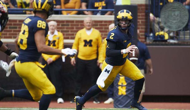 Oct 6, 2018; Ann Arbor, MI, USA; Michigan Wolverines quarterback Shea Patterson (2) rolls out to pass in the first half against Maryland Terrapins at Michigan Stadium. Photo Credit: Rick Osentoski-USA TODAY Sports