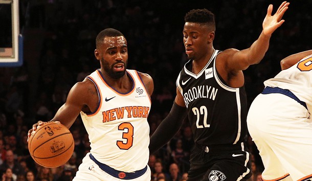 Oct 12, 2018; New York, NY, USA; New York Knicks guard Tim Hardaway Jr. (3) dribbles the ball while being defended by Brooklyn Nets guard Caris LeVert (22) during the first half at Madison Square Garden. Photo Credit: Andy Marlin-USA TODAY Sports
