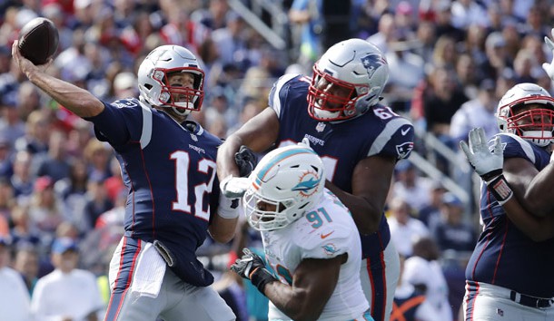 Sep 30, 2018; Foxborough, MA, USA; New England Patriots quarterback Tom Brady (12) throws a pass against the Miami Dolphins in the second quarter at Gillette Stadium. The Patriots defeated Miami 38-7. Photo Credit: David Butler II-USA TODAY Sports