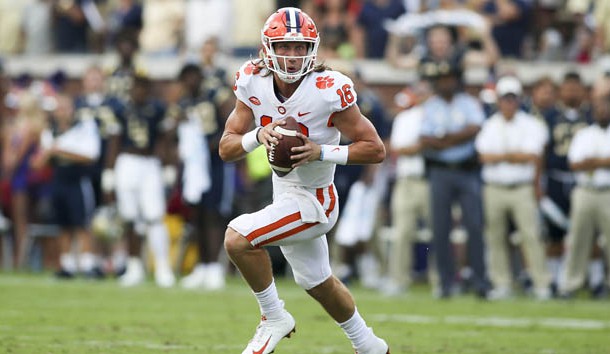 Sep 22, 2018; Atlanta, GA, USA; Clemson Tigers quarterback Trevor Lawrence (16) rolls out against the Georgia Tech Yellow Jackets in the first half at Bobby Dodd Stadium. Photo Credit: Brett Davis-USA TODAY Sports