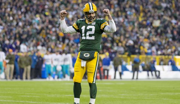 Nov 11, 2018; Green Bay, WI, USA; Green Bay Packers quarterback Aaron Rodgers (12) celebrates a touchdown during the second quarter against the Miami Dolphins at Lambeau Field. Photo Credit: Jeff Hanisch-USA TODAY Sports