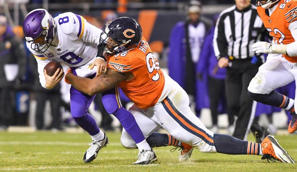 Nov 18, 2018; Chicago, IL, USA; Minnesota Vikings quarterback Kirk Cousins (8) is sacked by Chicago Bears defensive tackle Aklem Hicks (96) in the fourth quarter at Soldier Field. Photo Credit: Matt Cashore-USA TODAY Sports