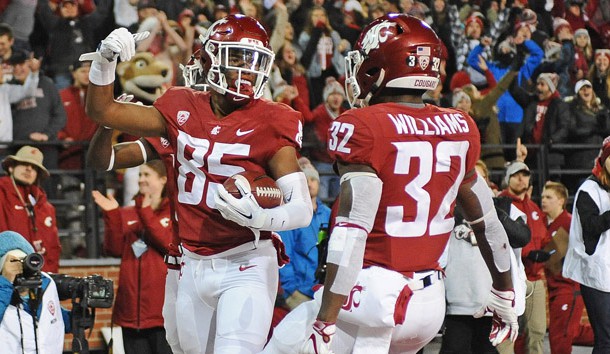 Nov 17, 2018; Pullman, WA, USA; Washington State Cougars wide receiver Calvin Jackson Jr. (85) celebrates a touchdown with teammate Washington State Cougars running back James Williams (32) during a game against the Arizona Wildcats in the first half at Martin Stadium. Photo Credit: James Snook-USA TODAY Sports