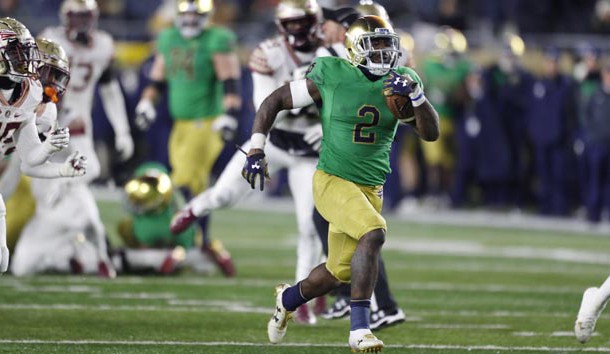 Nov 10, 2018; South Bend, IN, USA; Notre Dame Fighting Irish running back Dexter Williams (2) scores a touchdown on a 32 yard run against the Florida State Seminoles during the fourth quarter at Notre Dame Stadium. Photo Credit: Brian Spurlock-USA TODAY Sports