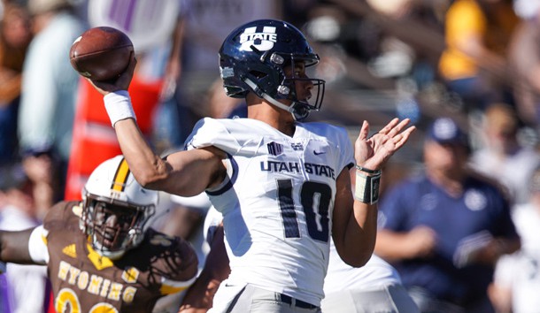 Oct 20, 2018; Laramie, WY, USA; Utah State Aggies quarterback Jordan Love (10) throws against the Wyoming Cowboys during the third quarter at Jonah Field War Memorial Stadium. Photo Credit: Troy Babbitt-USA TODAY Sports