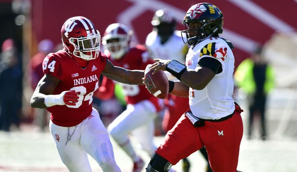 Nov 10, 2018; Bloomington, IN, USA; Maryland Terrapins quarterback Kasim Hill (11) runs the ball against Indiana Hoosiers linebacker Cam Jones (34) on a run during the fist half of the the game at Memorial Stadium . Photo Credit: Marc Lebryk-USA TODAY Sports