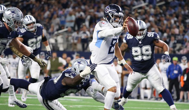 Nov 5, 2018; Arlington, TX, USA; Tennessee Titans quarterback Marcus Mariota (8) runs for a fourth quarter touchdown against Dallas Cowboys defensive end DeMarcus Lawrence (90) at AT&T Stadium. Photo Credit: Matthew Emmons-USA TODAY Sports