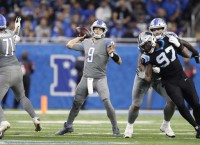Lions' Stafford reportedly played with broken back