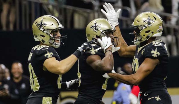 Nov 4, 2018; New Orleans, LA, USA; New Orleans Saints wide receiver Michael Thomas (13) pulls out a cell phone to celebrate a touchdown along with teammates wide receiver Austin Carr (80) and wide receiver Tre'Quan Smith (10) during the fourth quarter against the Los Angeles Rams at the Mercedes-Benz Superdome. Photo Credit: Derick E. Hingle-USA TODAY Sports
