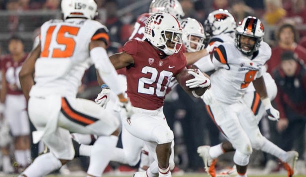Nov 10, 2018; Stanford, CA, USA; Stanford Cardinal running back Bryce Love (20) runs with the football against the Oregon State Beavers during the first quarter at Stanford Stadium. Photo Credit: Stan Szeto-USA TODAY Sports