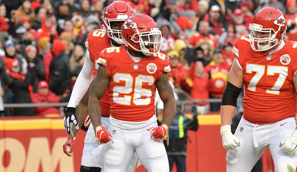 Dec 30, 2018; Kansas City, MO, USA; Kansas City Chiefs running back Damien Williams (26) celebrates after scoring during the first half against the Oakland Raiders at Arrowhead Stadium. Photo Credit: Denny Medley-USA TODAY Sports