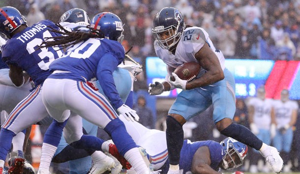 Dec 16, 2018; East Rutherford, NJ, USA; Tennessee Titans running back Derrick Henry (22) runs for a touchdown against New York Giants cornerback Janoris Jenkins (20) during the first quarter at MetLife Stadium. Photo Credit: Brad Penner-USA TODAY Sports