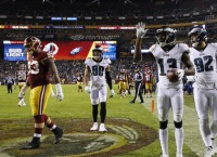 Eagles rout Redskins and earn playoff berth